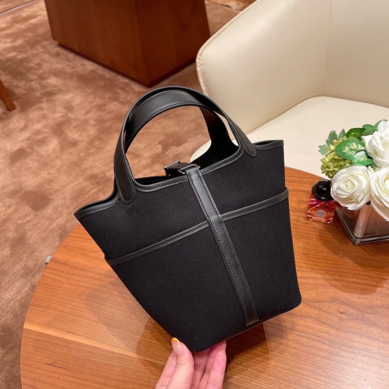 H**mes shopping bags